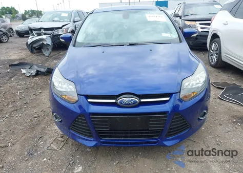 2012 Ford Focus Titanium z USA, uszkodzony, nr VIN 1FAHP3N24CL283473